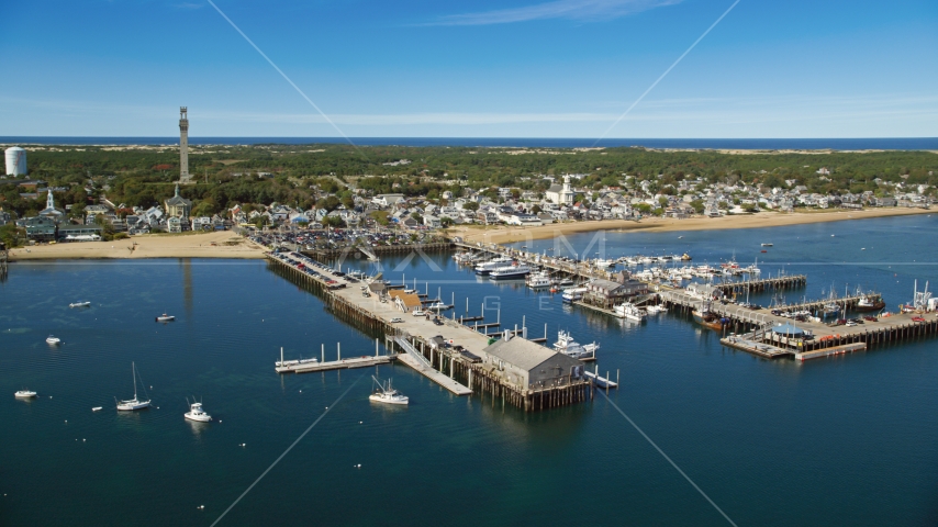 Piers and boats near a small coastal town, Provincetown, Massachusetts Aerial Stock Photo AX143_224.0000000 | Axiom Images