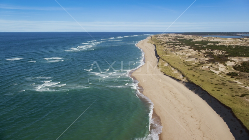 A long strip of empty beach, Cape Cod, Provincetown, Massachusetts Aerial Stock Photo AX144_006.0000043 | Axiom Images