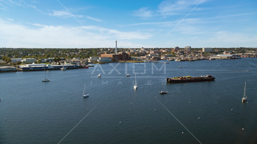 A coastal community, and a factory with smoke stack, New Bedford, Massachusetts Aerial Stock Photo AX144_192.0000000 | Axiom Images