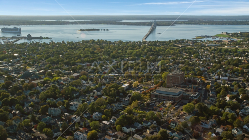 A coastal community near a bridge spanning the water, Newport, Rhode Island Aerial Stock Photo AX144_227.0000210 | Axiom Images