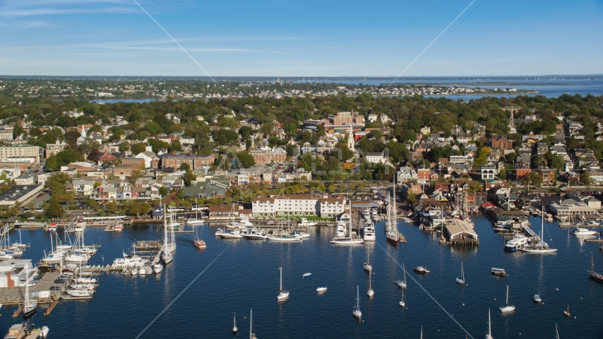 Boats docked at piers in the busy harbor in Newport, Rhode Island Aerial Stock Photo AX144_232.0000172 | Axiom Images