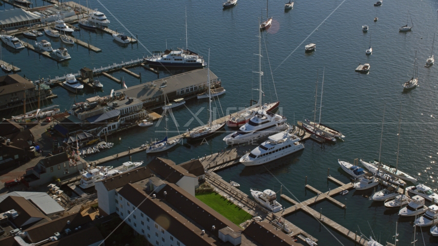 Yachts and sailboats docked at piers in Newport, Rhode Island Aerial Stock Photo AX144_238.0000000 | Axiom Images