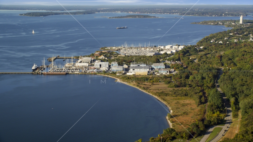 Marinas and warehouses on the coast in Portsmouth, Rhode Island Aerial Stock Photo AX145_005.0000000 | Axiom Images