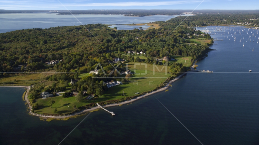 Waterfront mansions with green lawns, trees, Bristol, Rhode Island Aerial Stock Photo AX145_012.0000143 | Axiom Images