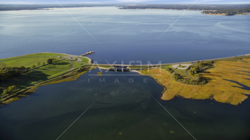 A small bridge beside a bay in Bristol, Rhode Island Aerial Stock Photo AX145_014.0000067 | Axiom Images