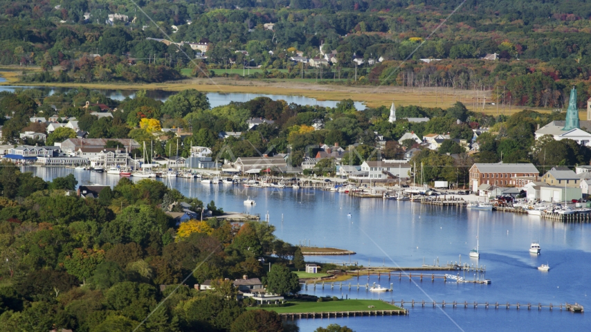 A small coastal town, waterfront properties, and sailboats, Warren, Rhode Island Aerial Stock Photo AX145_016.0000312 | Axiom Images