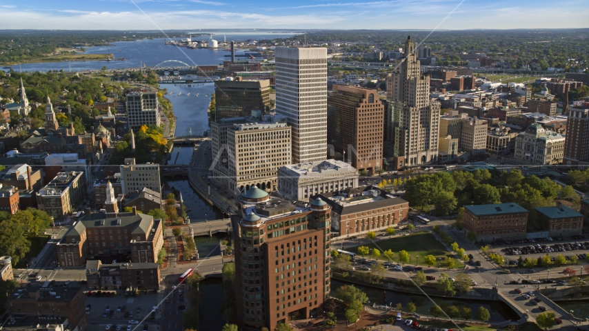 Downtown skyscrapers overlooking the river in Downtown Providence, Rhode Island Aerial Stock Photo AX145_042.0000100 | Axiom Images