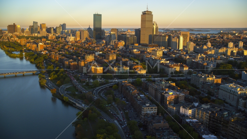 Back Bay and city skyscrapers, Downtown Boston, Massachusetts, sunset Aerial Stock Photo AX146_060.0000009F | Axiom Images
