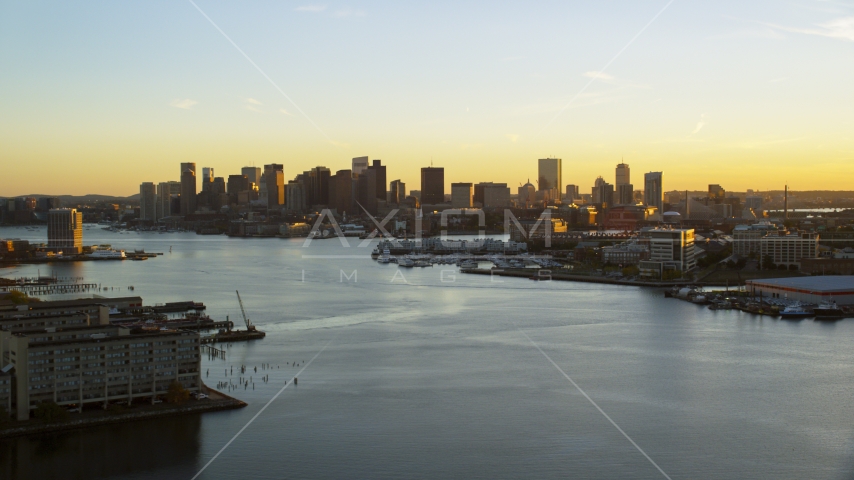 The Charles River and city skyline of Downtown Boston, Massachusetts, sunset Aerial Stock Photo AX146_075.0000302F | Axiom Images