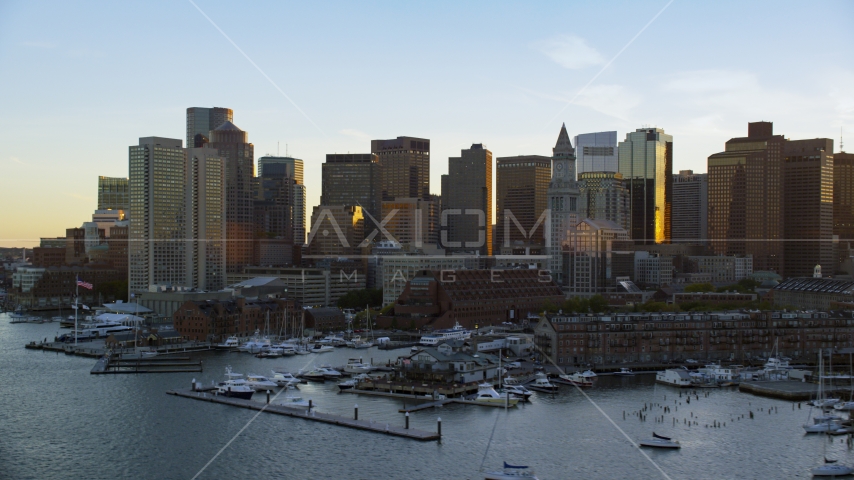 The skyline of Downtown Boston, Massachusetts, sunset Aerial Stock Photo AX146_080.0000314F | Axiom Images
