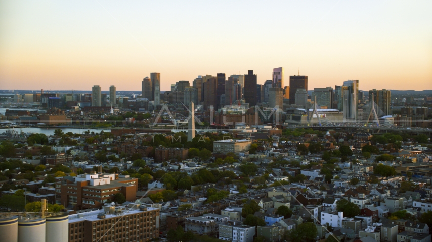 The Bunker Hill Monument and the Downtown Boston skyline, Charlestown, Massachusetts, sunset Aerial Stock Photo AX146_094.0000191F | Axiom Images