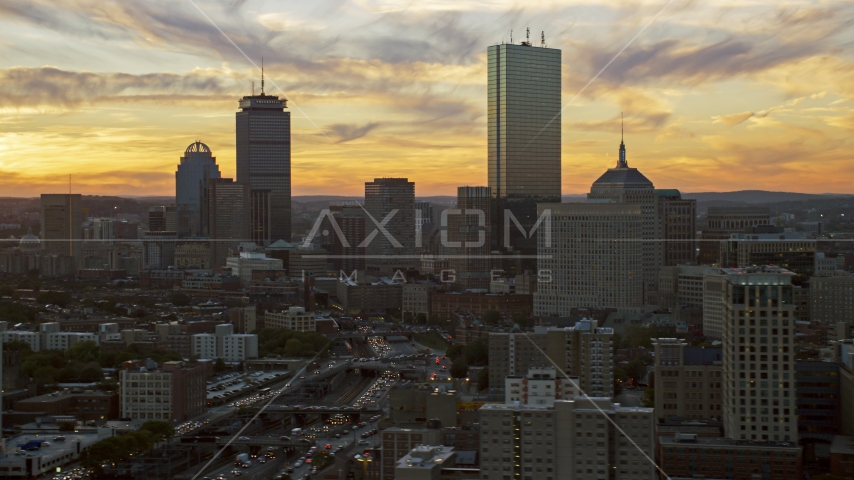 Towering city skyscrapers in Downtown Boston, Massachusetts, sunset Aerial Stock Photo AX146_113.0000175F | Axiom Images
