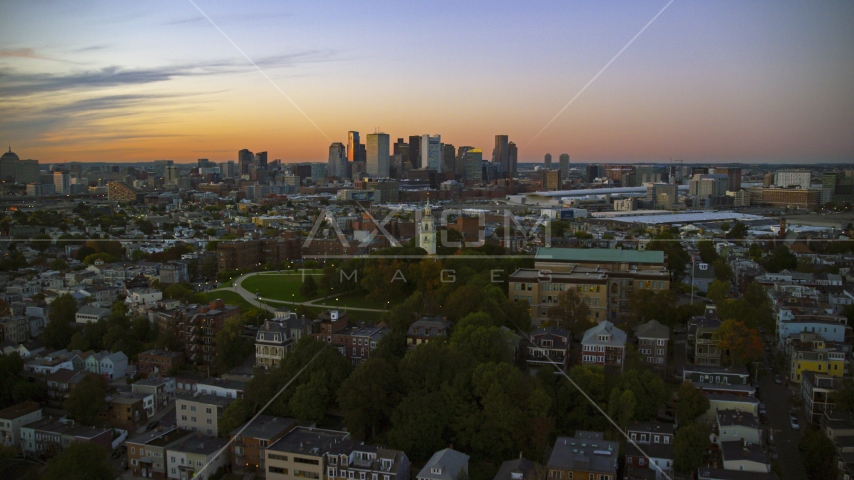 The Dorchester Heights Monument and the city skyline, South Boston, Massachusetts, twilight Aerial Stock Photo AX146_121.0000000F | Axiom Images