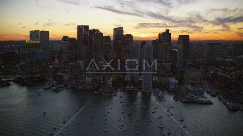 Rowes Wharf and skyscrapers at twilight, Downtown Boston, Massachusetts Aerial Stock Photo AX146_134.0000208F | Axiom Images
