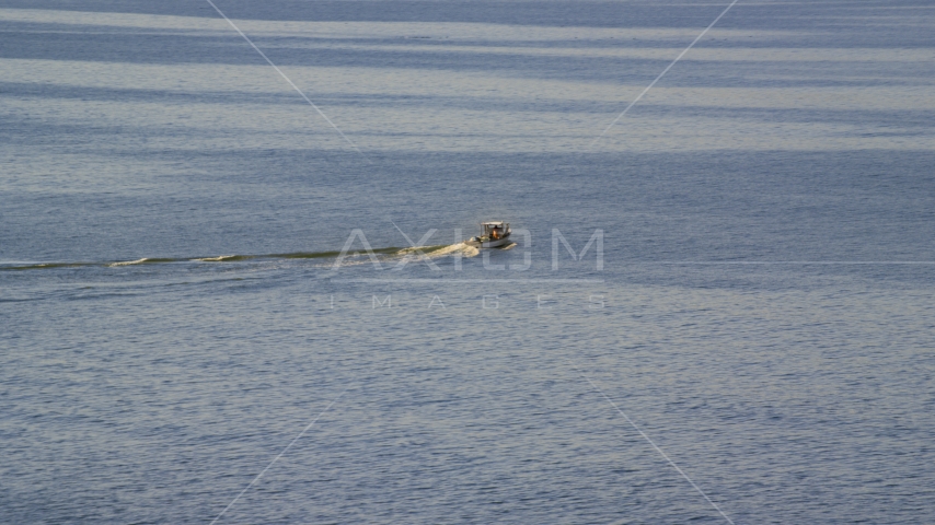 A fishing boat on Broad Sound, Revere, Massachusetts Aerial Stock Photo AX147_015.0000046 | Axiom Images