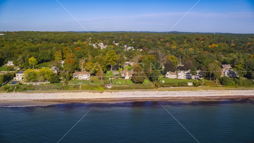 Beachfront mansions and fall foliage, autumn, Beverly, Massachusetts Aerial Stock Photo AX147_058.0000143 | Axiom Images