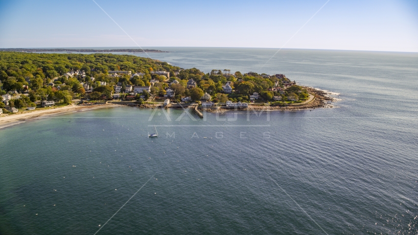 Oceanfront homes and rocky coast, Gloucester, Massachusetts Aerial Stock Photo AX147_079.0000000 | Axiom Images