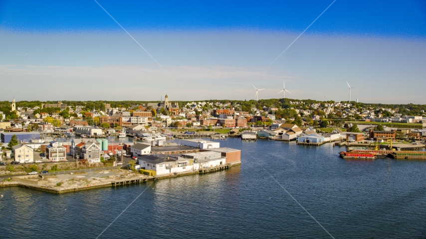 A coastal town with small warehouse buildings, Gloucester, Massachusetts Aerial Stock Photo AX147_087.0000192 | Axiom Images
