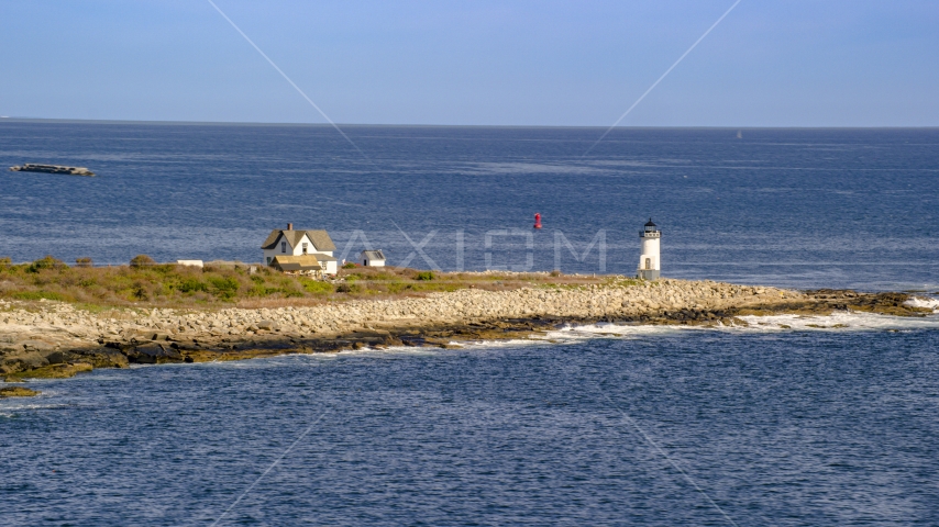 A lighthouse on Straitsmouth Island, Rockport, Massachusetts Aerial Stock Photo AX147_116.0000000 | Axiom Images