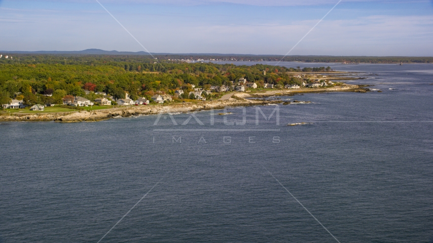 Beachfront homes in autumn seen from the ocean, Rye, New Hampshire Aerial Stock Photo AX147_167.0000000 | Axiom Images