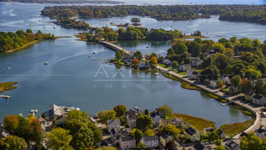 A small bridge and waterfront homes in autumn, Portsmouth, New Hampshire Aerial Stock Photo AX147_186.0000000 | Axiom Images