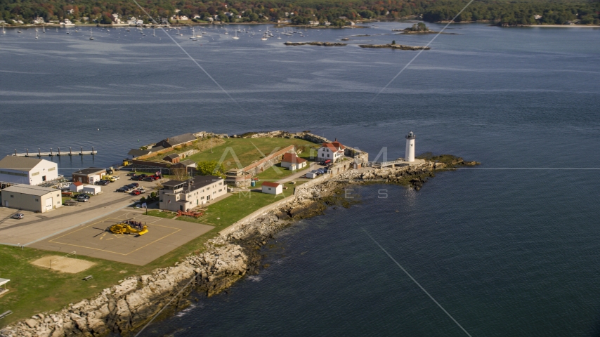 Lighthouse and fort on New Castle Island in autumn, New Castle, New Hampshire Aerial Stock Photo AX147_192.0000271 | Axiom Images