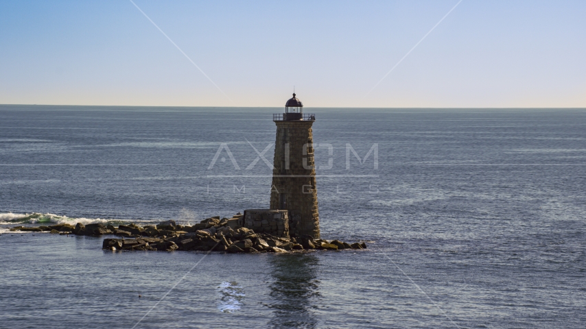 A view of a lighthouse overlooking the ocean, Kittery, Maine Aerial Stock Photo AX147_194.0000260 | Axiom Images
