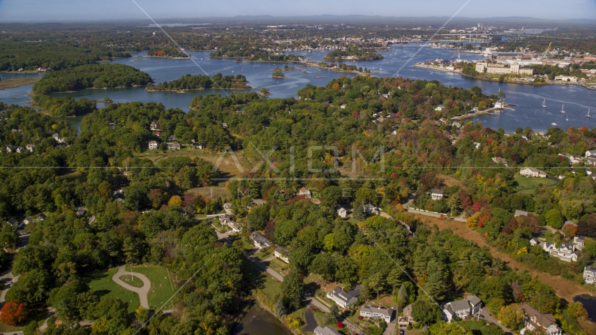 Autumn trees in a coastal town, New Castle, Portsmouth, New Hampshire Aerial Stock Photo AX147_199.0000000 | Axiom Images