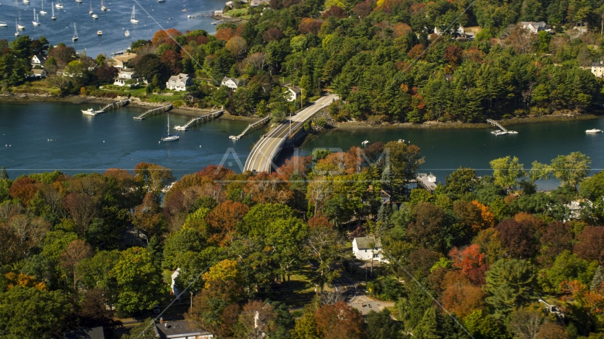 A small bridge and colorful autumn trees, Kittery, Maine Aerial Stock Photo AX147_226.0000150 | Axiom Images
