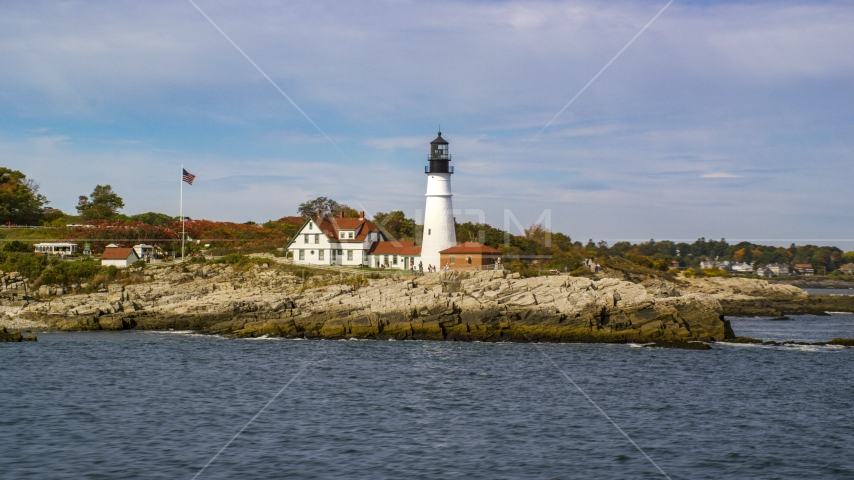 The Portland Head Light seen from the water, autumn, Cape Elizabeth, Maine Aerial Stock Photo AX147_312.0000000 | Axiom Images