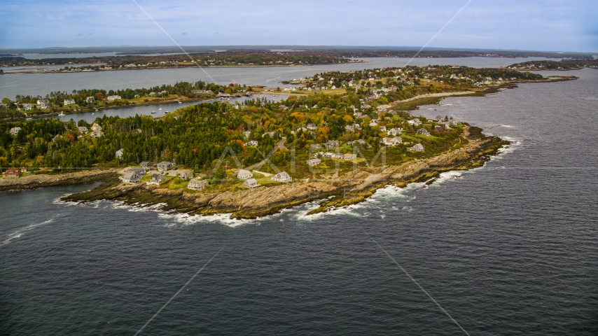 A coastal town on Bailey Island with autumn trees, Harpswell, Maine Aerial Stock Photo AX147_379.0000071 | Axiom Images