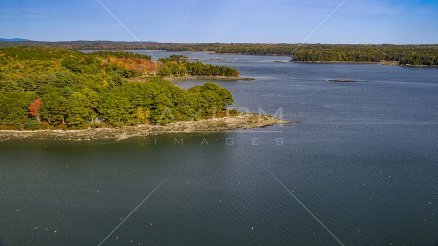 Forested islands, The Narrows in autumn, Waldoboro, Maine Aerial Stock Photo AX148_029.0000234 | Axiom Images