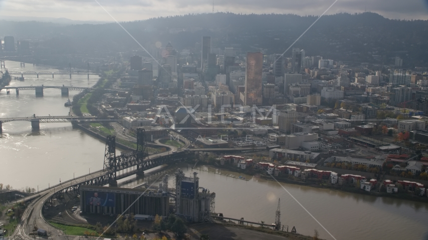 Bridges spanning the Willamette River and skyscrapers in Downtown Portland, Oregon Aerial Stock Photo AX153_114.0000291F | Axiom Images