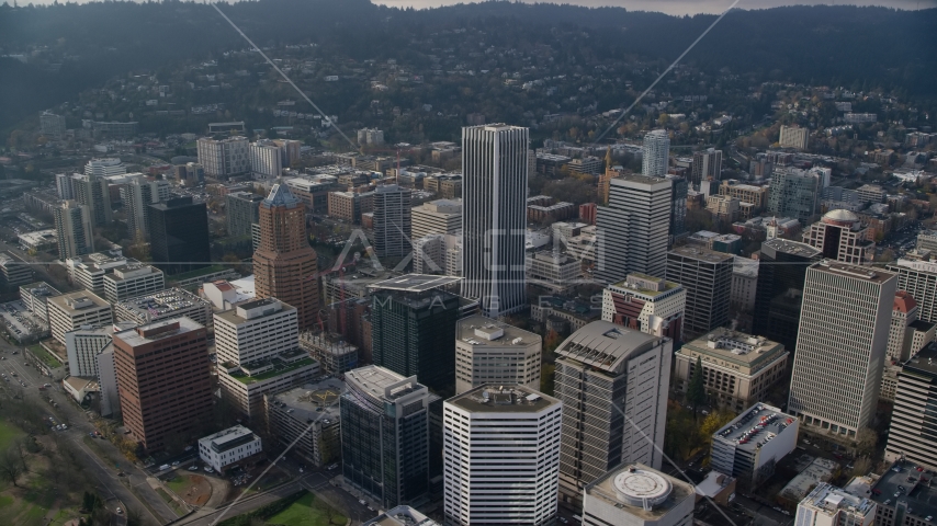A view of KOIN Center, Wells Fargo Center, and high-rises in Downtown Portland, Oregon Aerial Stock Photo AX153_125.0000231F | Axiom Images