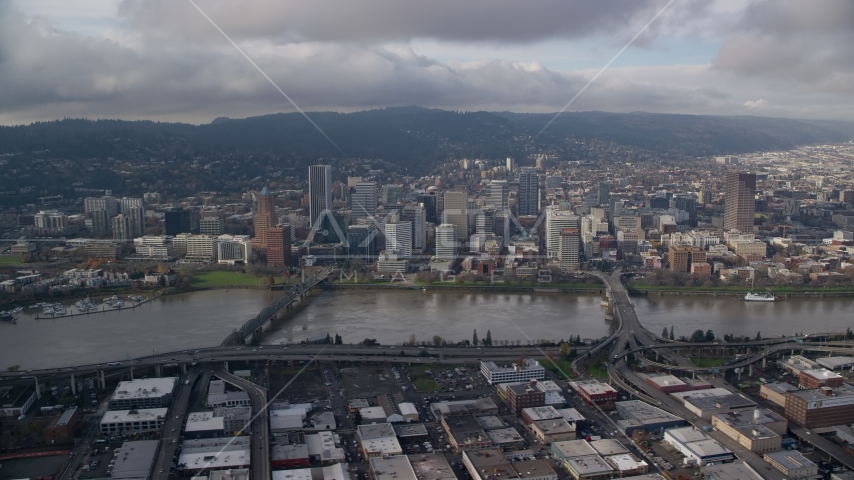 Hawthorne and Morrison Bridges, and skyscrapers in Downtown Portland, Oregon Aerial Stock Photo AX153_127.0000000F | Axiom Images