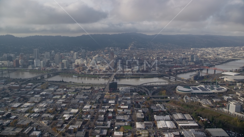 Downtown Portland, Willamette River bridges, and the convention center, seen from Lloyd District in Oregon Aerial Stock Photo AX153_129.0000000F | Axiom Images