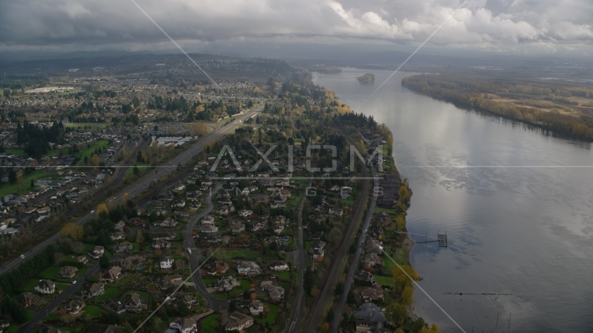 Suburban riverfront neighborhoods by Highway 14 in Vancouver, Washington Aerial Stock Photo AX153_141.0000277F | Axiom Images