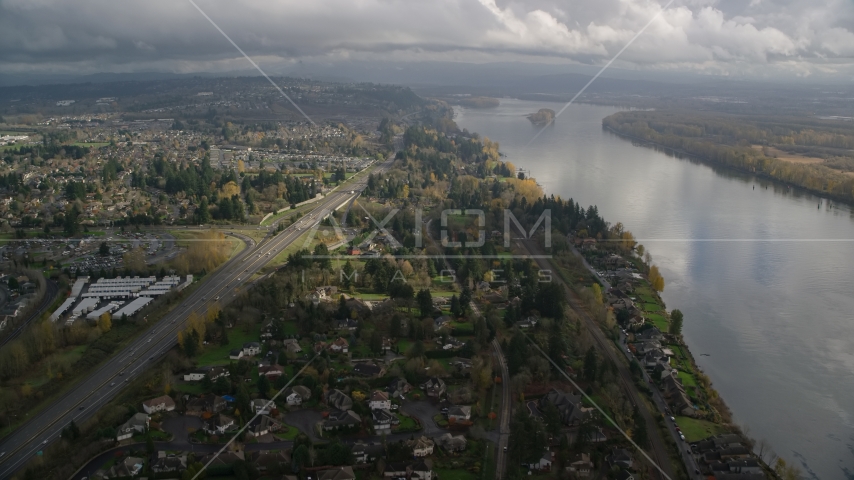 Highway 14 and suburban homes on the Columbia River in Vancouver, Washington Aerial Stock Photo AX153_142.0000206F | Axiom Images