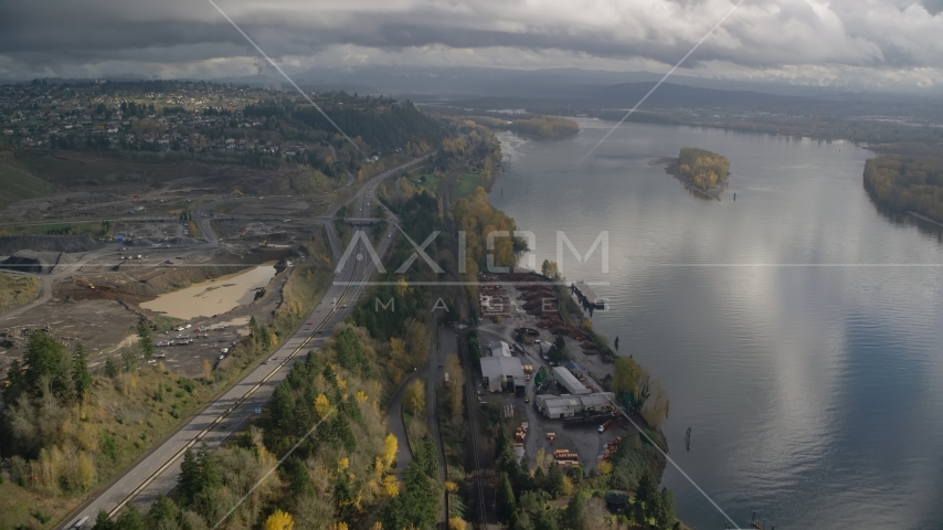 A lumber mill on the Columbia River near Highway 14, Camas and Vancouver, Washington Aerial Stock Photo AX153_145.0000185F | Axiom Images