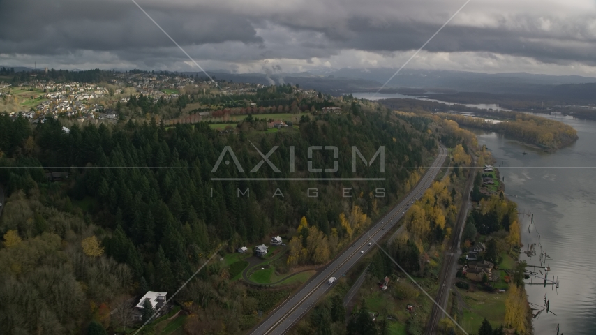High above Highway 14 and hilltop suburban homes, autumn, Camas, Washington Aerial Stock Photo AX153_146.0000208F | Axiom Images