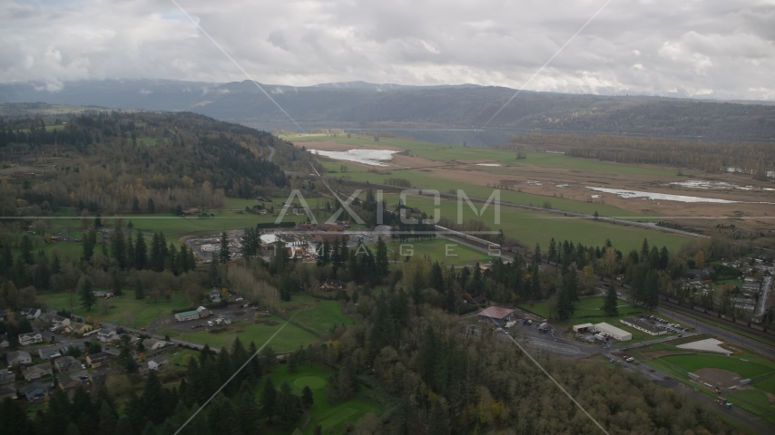 Train traveling through countryside, Washougal, Washington Aerial Stock Photo AX153_176.0000111F | Axiom Images