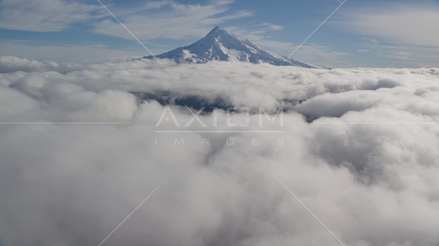The snowy summit and a blanket of clouds, Mount Hood, Cascade Range, Oregon Aerial Stock Photo AX154_066.0000000F | Axiom Images