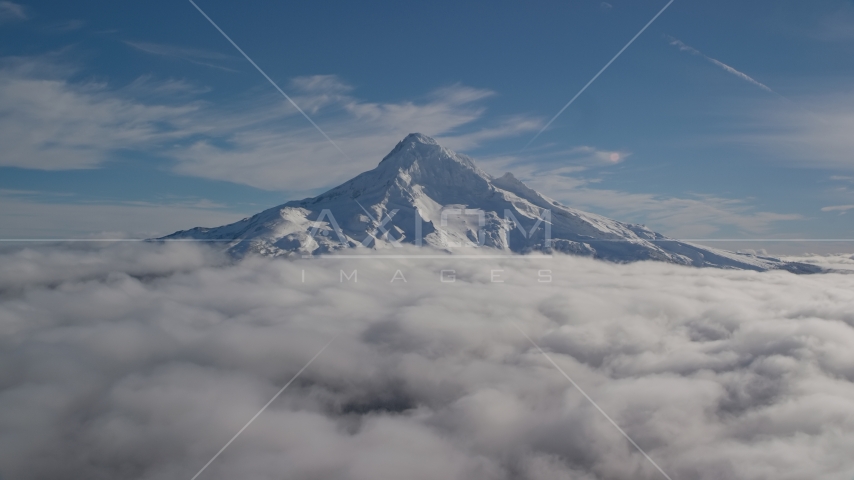 The summit of Mount Hood with snow and low clouds, Mount Hood, Cascade Range, Oregon Aerial Stock Photo AX154_070.0000000F | Axiom Images