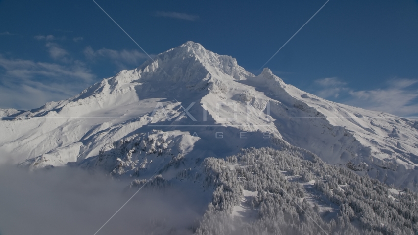 Mount Hood covered in snow in the Cascade Range, Oregon Aerial Stock Photo AX154_079.0000219F | Axiom Images