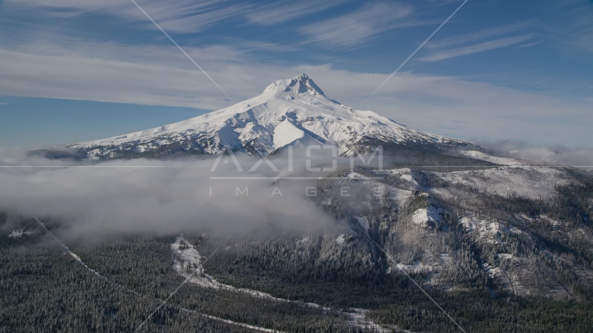 Low clouds over snowy forest near Mount Hood, Cascade Range, Oregon Aerial Stock Photo AX154_108.0000000F | Axiom Images