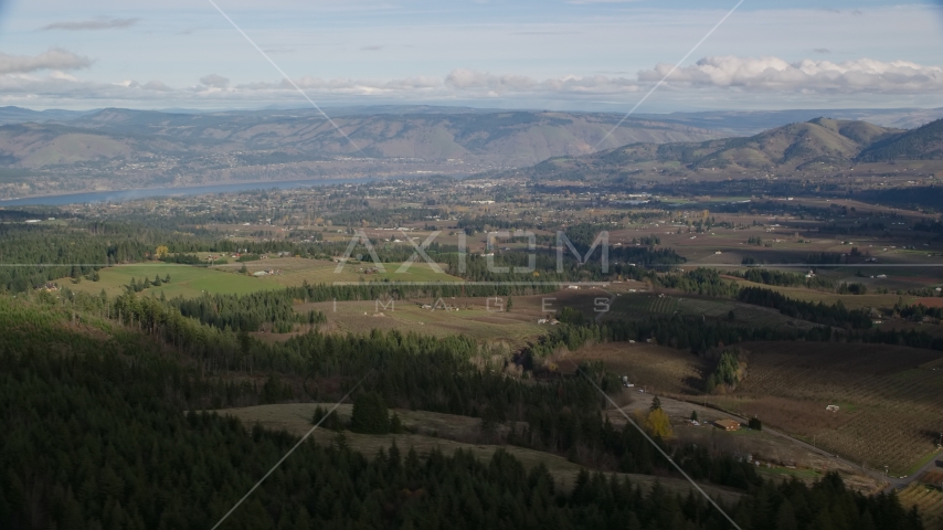 A view across farms in Hood River, Oregon Aerial Stock Photo AX154_149.0000336F | Axiom Images