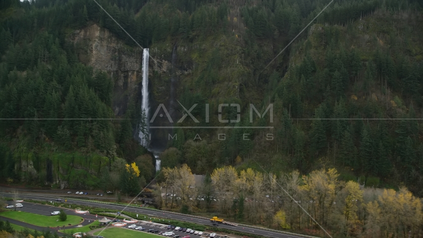 I-84 highway by Multnomah Falls on a cliff face of the Columbia River Gorge Aerial Stock Photo AX154_189.0000297F | Axiom Images
