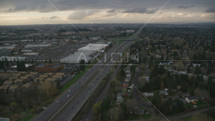Apartment buildings along Highway 26 by Tanasbourne Town Center in Hillsboro, Oregon, sunset Aerial Stock Photo AX155_127.0000321F | Axiom Images