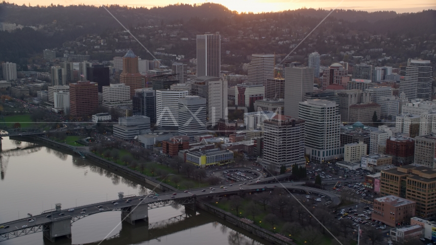 Downtown Portland skyscrapers and city park beside the Willamette River at sunset Aerial Stock Photo AX155_155.0000000F | Axiom Images
