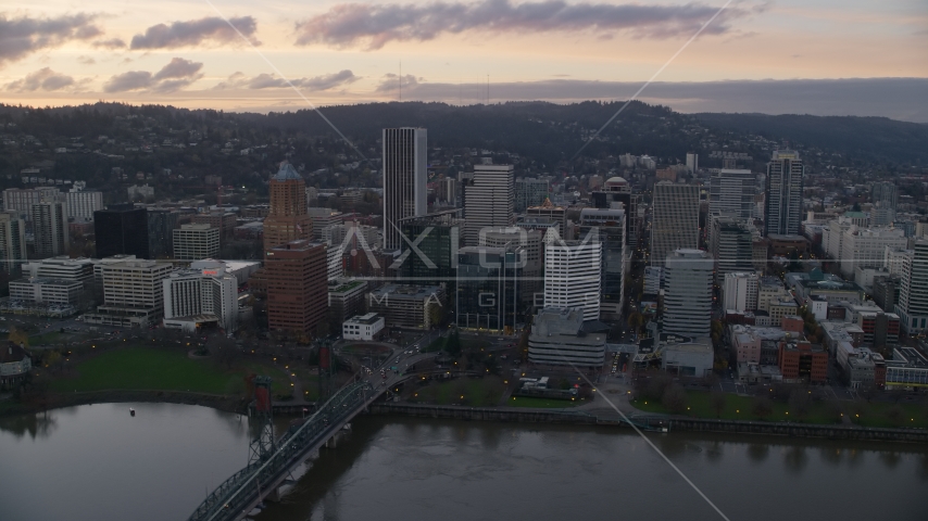 Hawthorne Bridge, waterfront park, and Downtown Portland at sunset in Oregon Aerial Stock Photo AX155_173.0000275F | Axiom Images